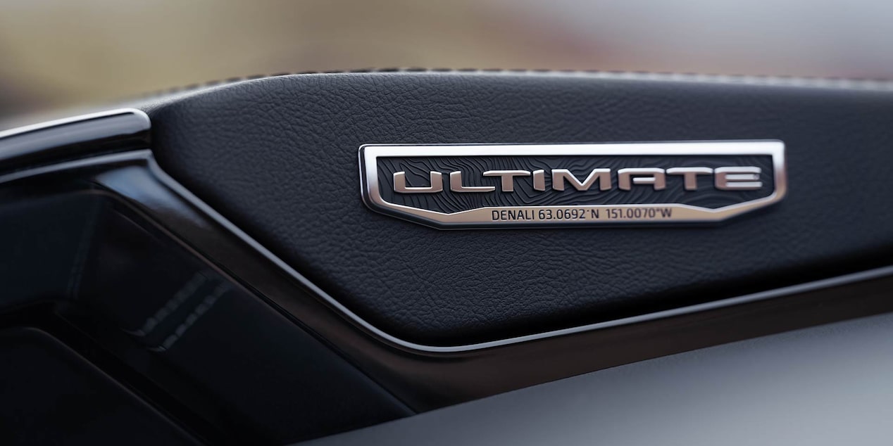 Close-up view of the Ultimate badging inside the 2025 GMC Yukon SUV.