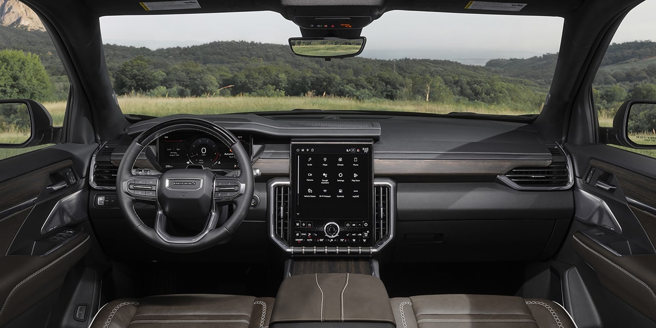 Spacious front interiors of the 2026 GMC Acadia Denali Ultimate.
