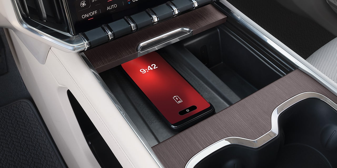 A Smartphone Charging inside the 2026 GMC Acadia Denali.