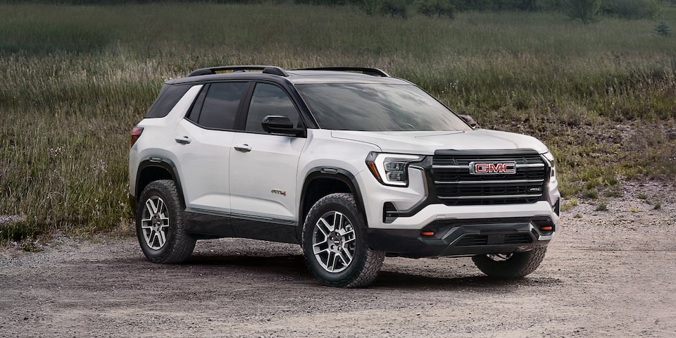 Front Three-Quarter View of the 2026 GMC Terrain AT4 Small Off-Road SUV Parked at the Beach.