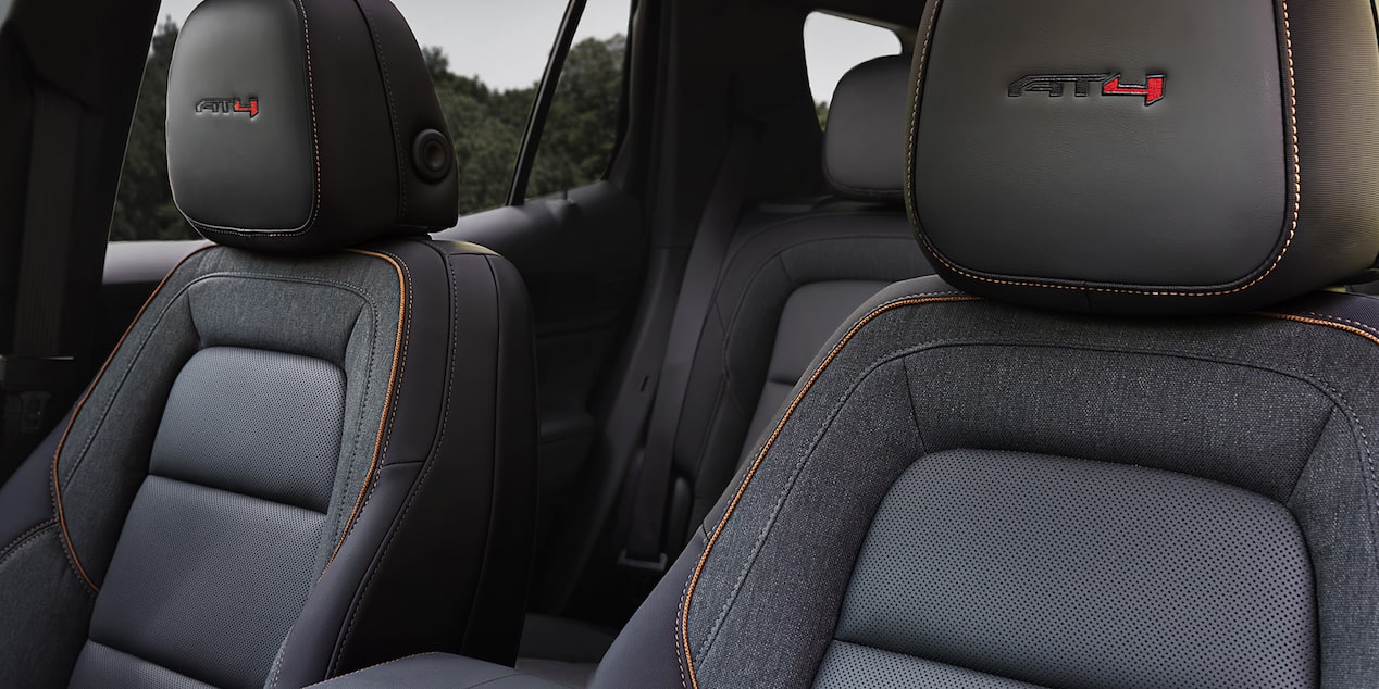 Close-up of the AT4 Badging on the Front Row Seats in the 2026 GMC Terrain AT4 Small Off-Road SUV.