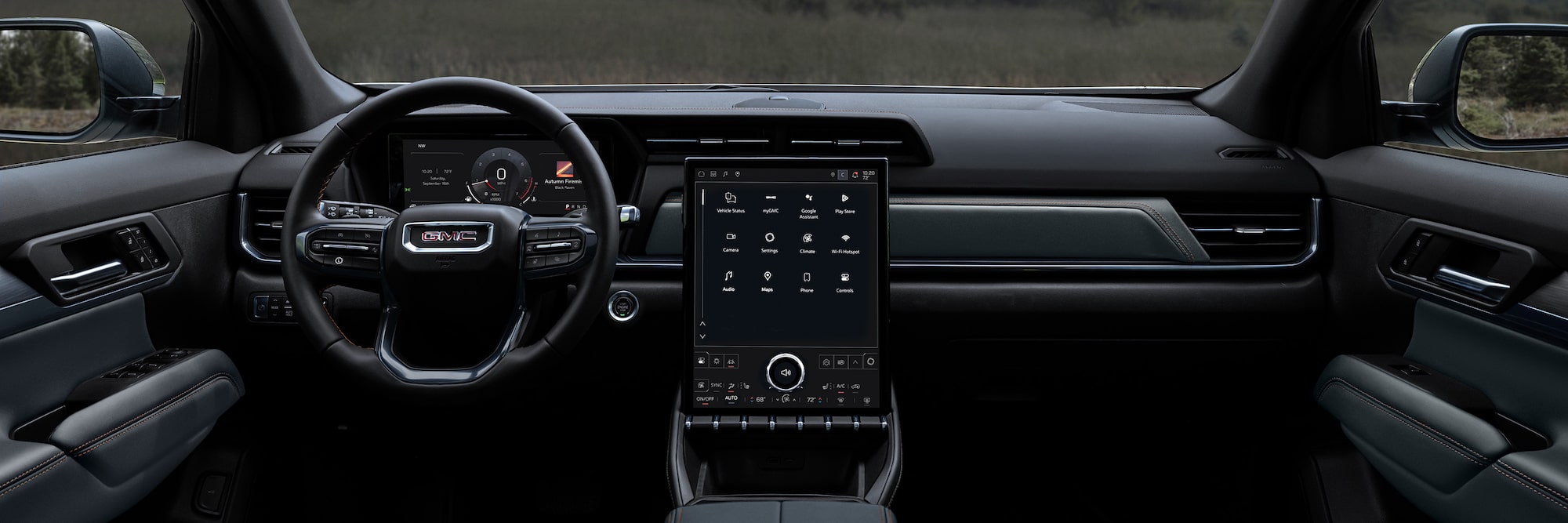 Vue du tableau de bord, du volant et du système d’infodivertissement du VUS compact hors route GMC Terrain AT4 2026.
