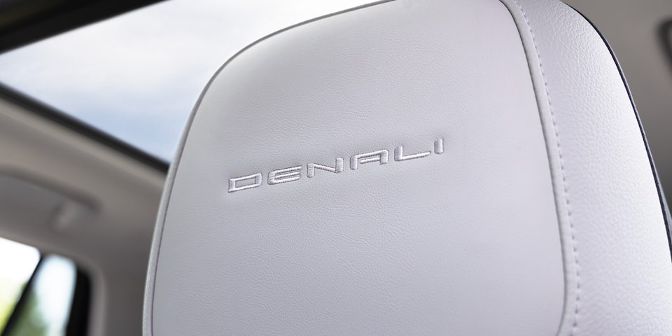 Close-up of the Denali Badging on the Headrest in the 2026 GMC Terrain Denali.