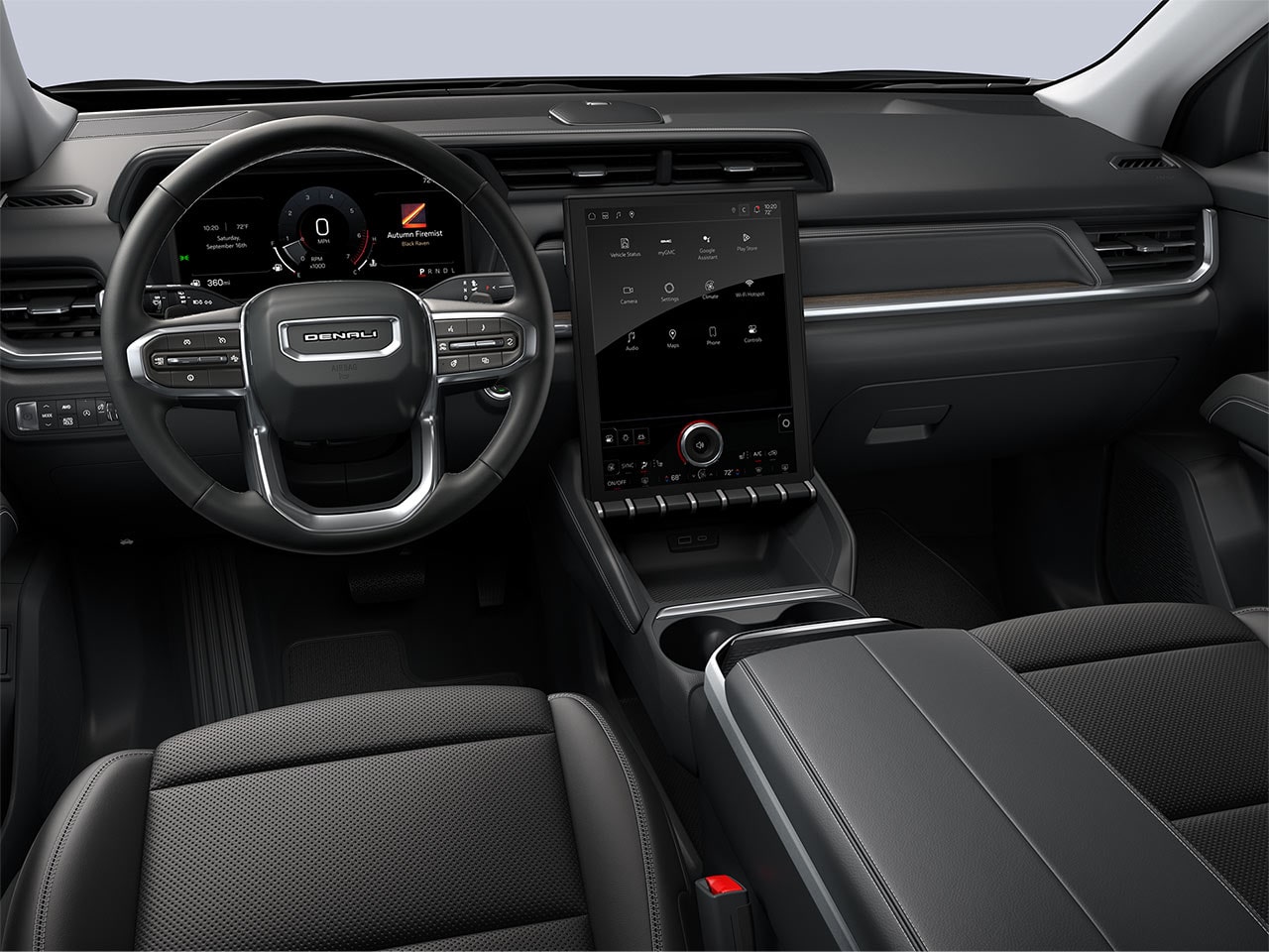 The Driver's Side Interior of a 2027 GMC Terrain Denali with Black Leather Seats, Steering Wheel, and Infotainment System.