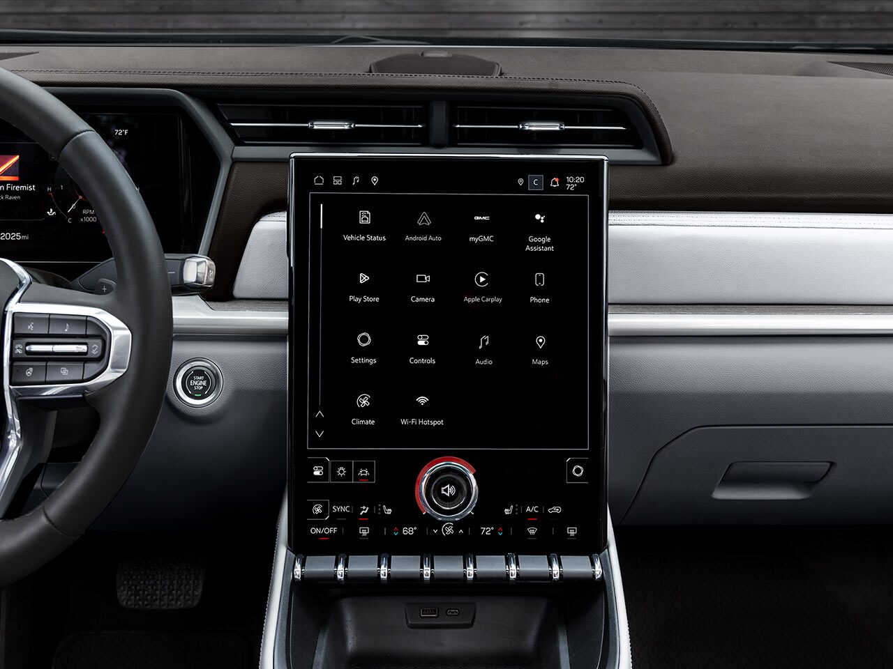 The Wide Interior View of the 2027 GMC Terrain Denali Dashboard Showing the Steering Wheel and Large Infotainment Screen.