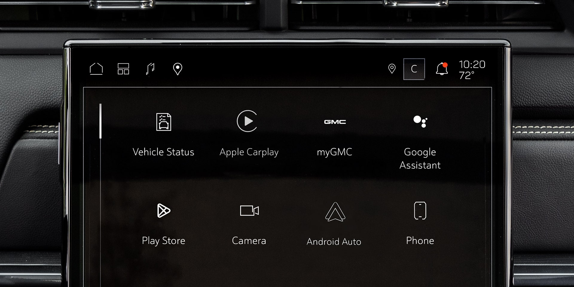 L’écran noir d’infodivertissement d’un véhicule GMC Terrain 2027 affiche les applications principales, notamment l’état du véhicule, les modes de conduite, le terrain GMC 2027 my2027 et l’Assistant Google.