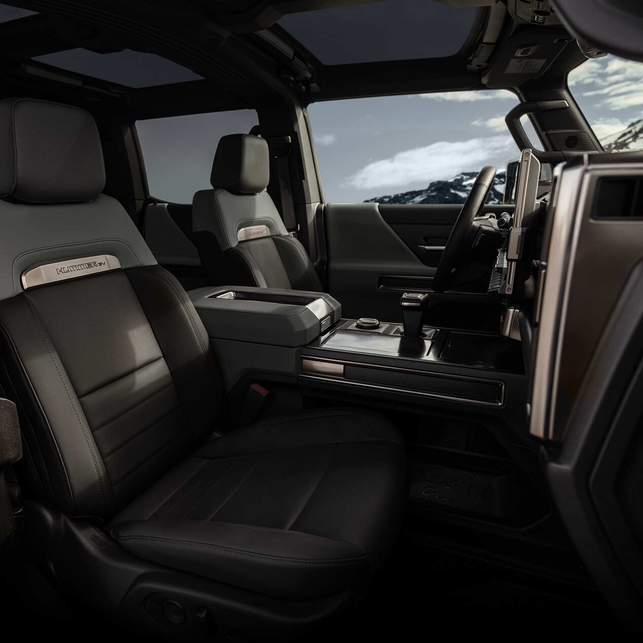 Interior front row seats of the GMC HUMMER EV Pickup Truck.