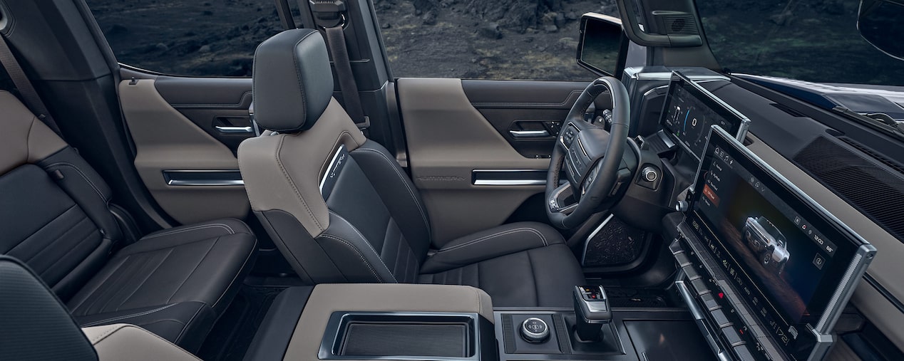Side View of the 2026 GMC Hummer EV Pickup Truck Front Row and Back Seat Cabin.