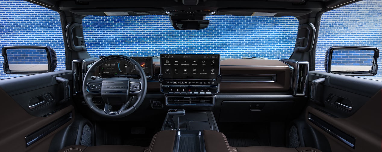 Front interiors of the 2026 GMC Hummer EV Pickup Truck.