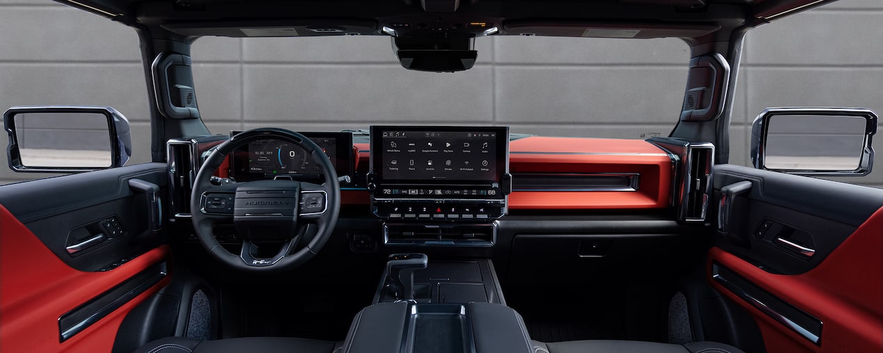 Back Seat View of the Front Row Interiors of the 2026 GMC Hummer EV Pickup Truck.