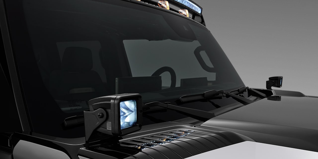 Close-up of a Personalized 2026 GMC Hummer EV Pickup Truck with Lights Added to the Hood.