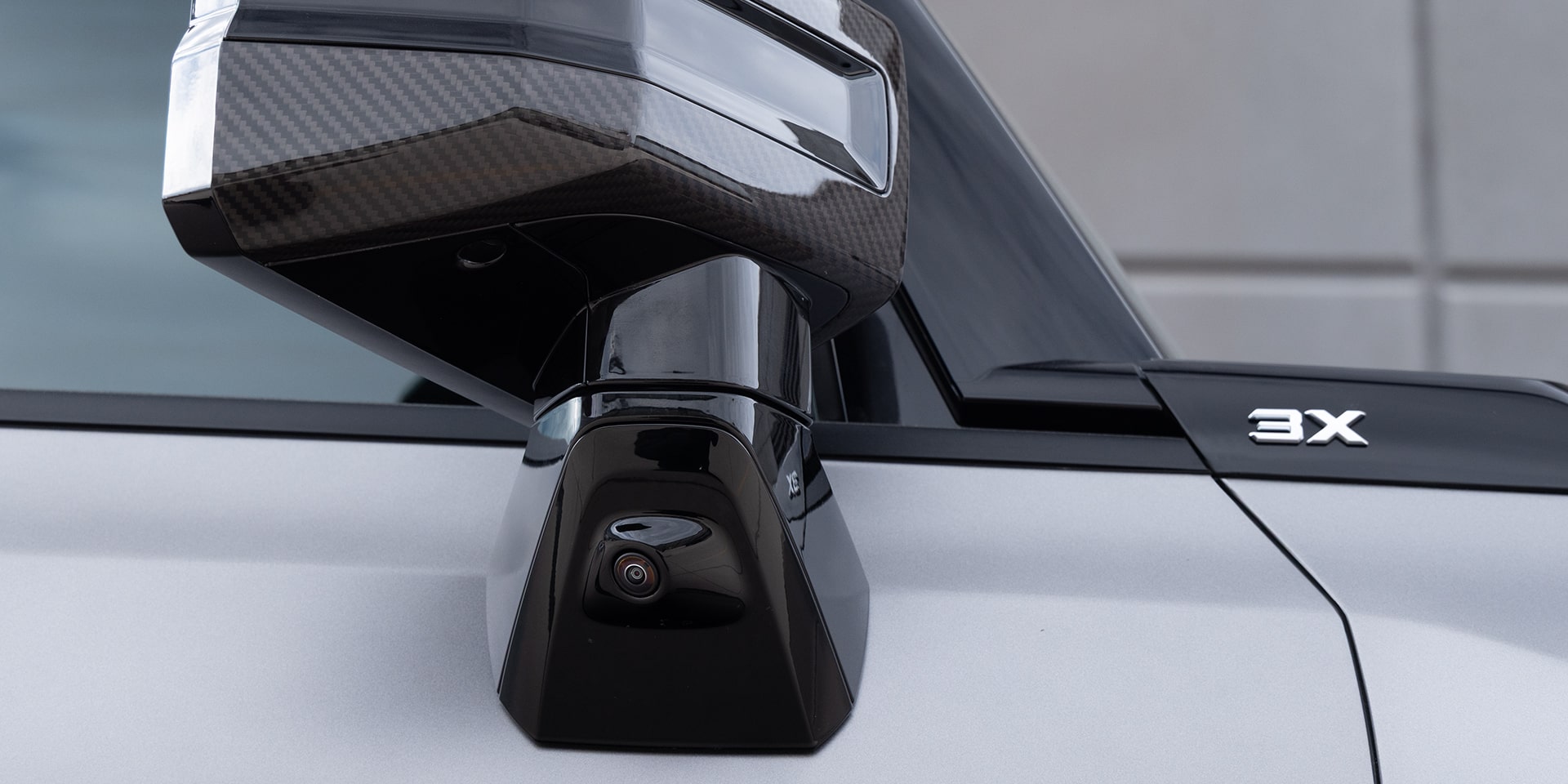 Close-up View of the 2026 GMC Hummer EV Pickup Truck's Ultra Vision Camera on the Exterior Side Mirror.