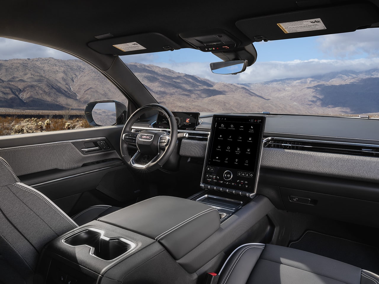 L’habitacle du GMC Sierra EV 2026 vu par le passager avant.