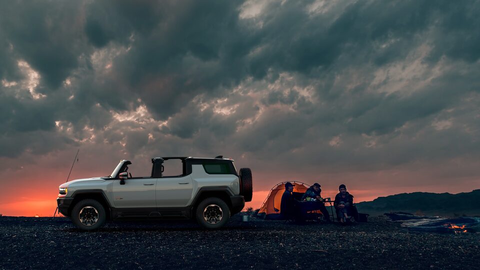 Side view of the Hummer EV SUV.