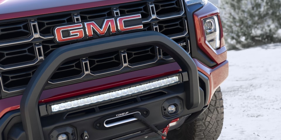 Close-up view of the 2023 Canyon AT4X grille.
