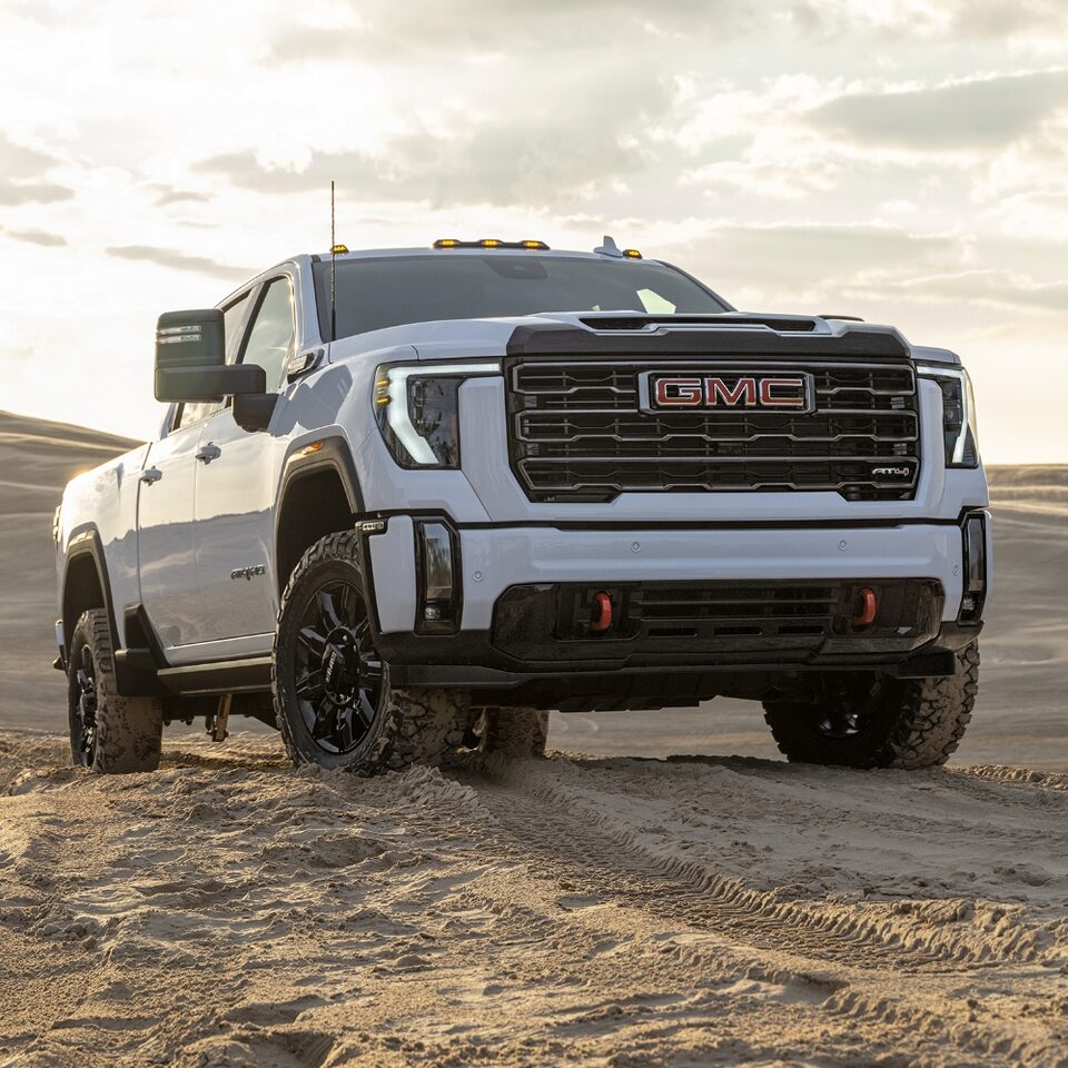 Front right profile view of the 2024 Sierra HD AT4: Premium Off-Roading.