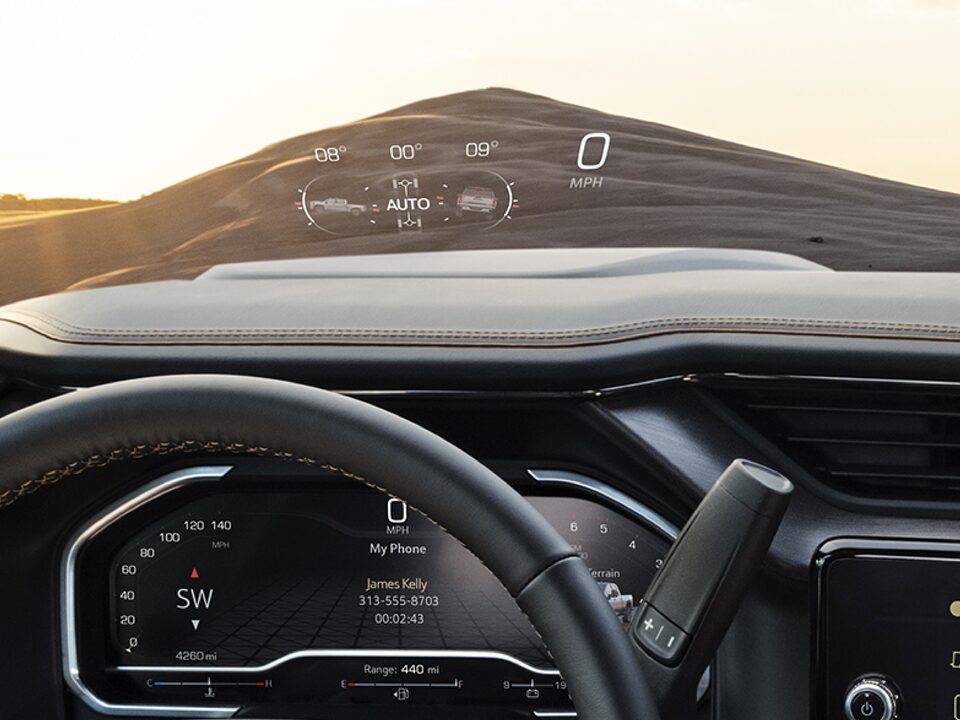 Reflected heads-up display of the 2024 GMC Sierra HD.