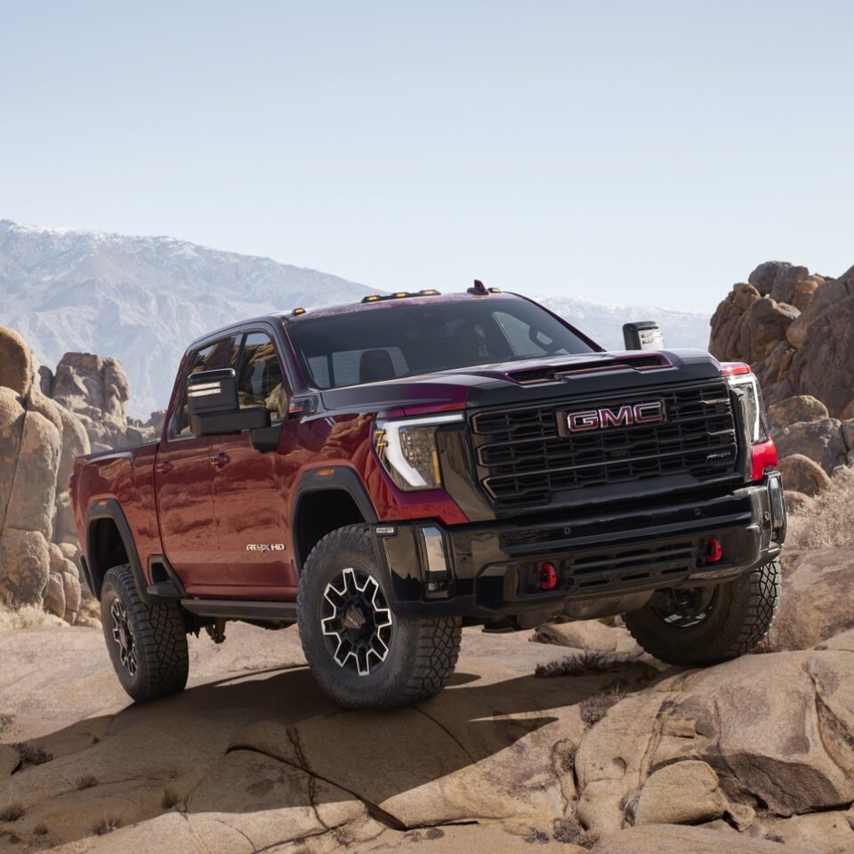 The 2024 Sierra HD AT4X on rough terrain.