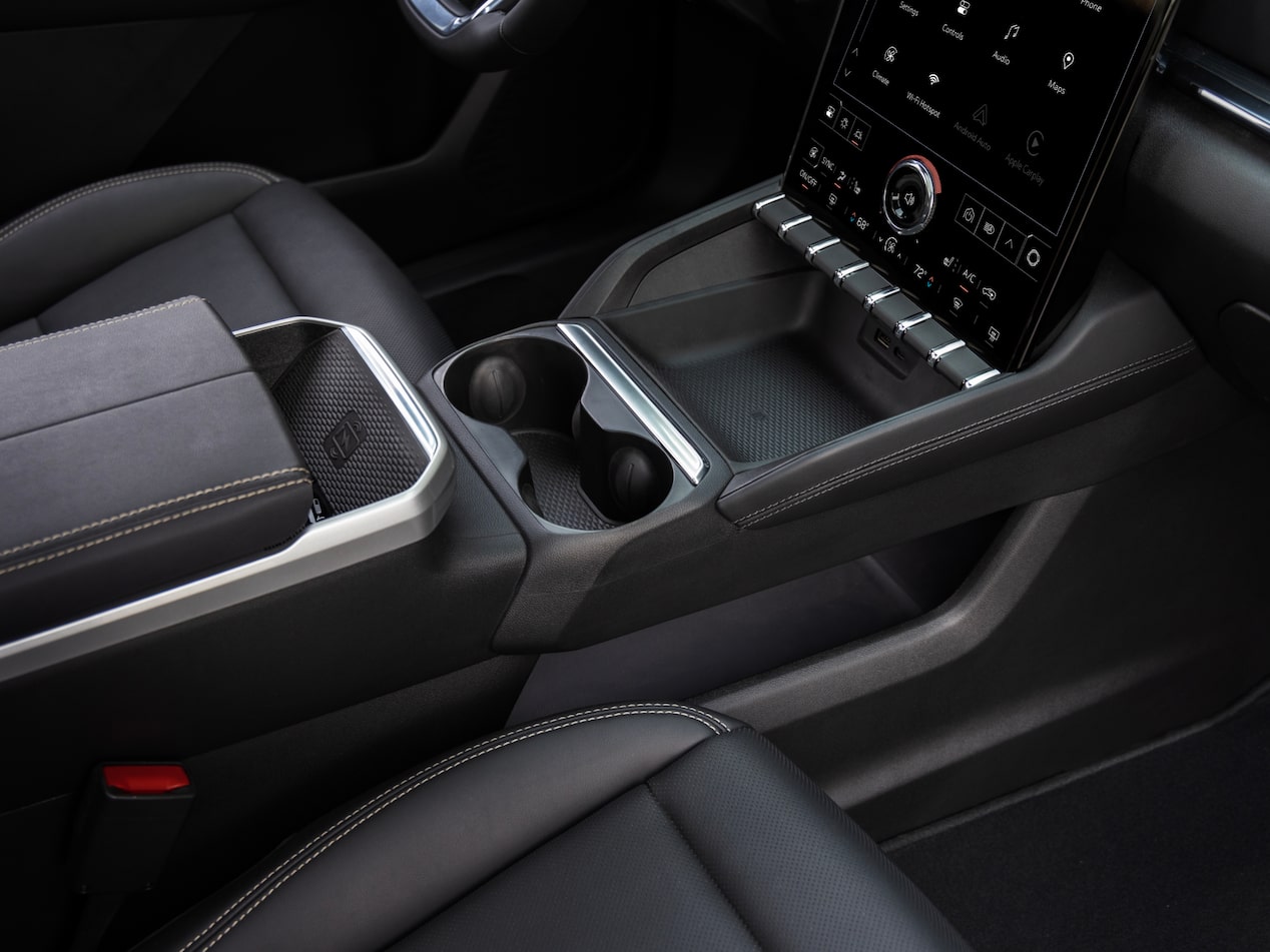 Side view of the cup holder inside the 2025 GMC Terrain Elevation.