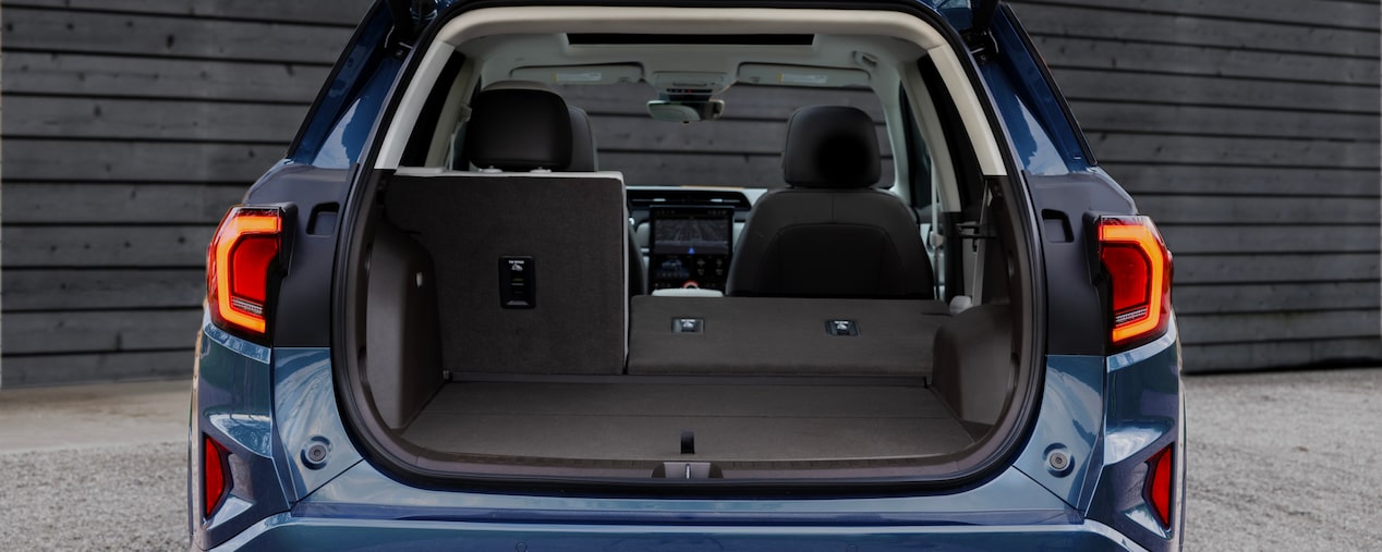Back view of the 2025 GMC Terrain with its trunk open.