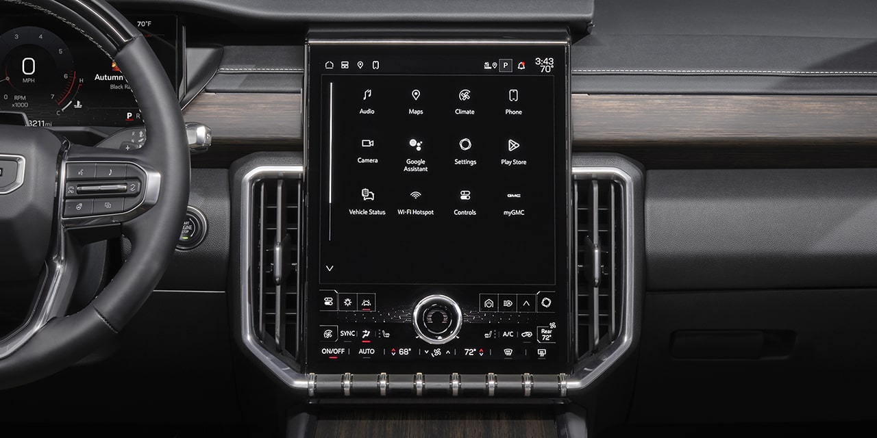Vue rapprochée du système d’infodivertissement haut de gamme du GMC Acadia Denali Ultimate 2026.