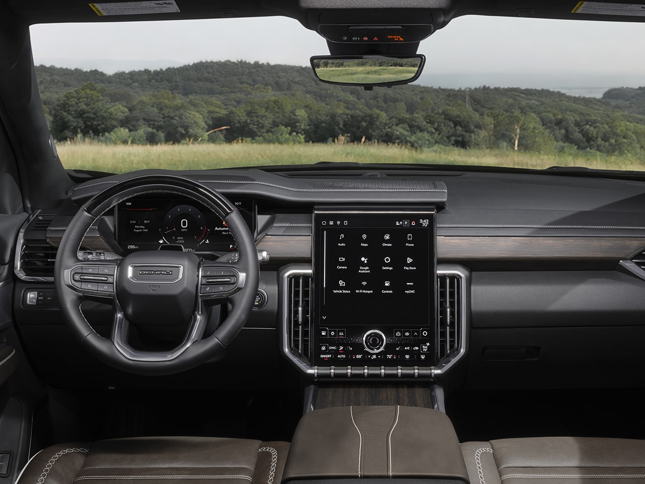 Habitacle côté conducteur spacieux du GMC Acadia Denali Ultimate 2026.