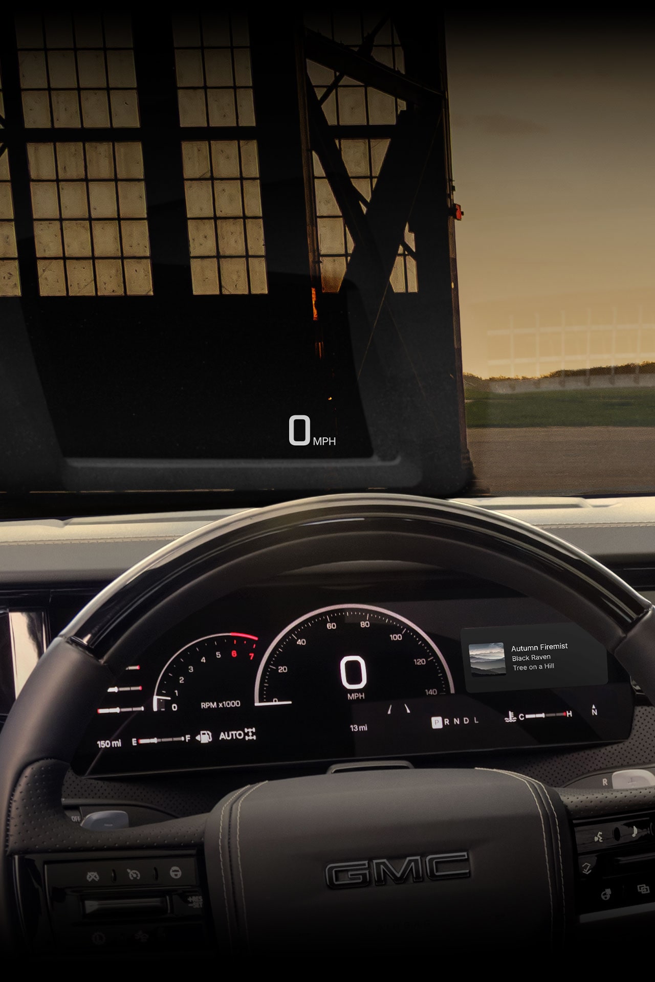 Vue du conducteur sur le volant et le tableau de bord de la prochaine génération de la GMC Sierra 1500 2027.