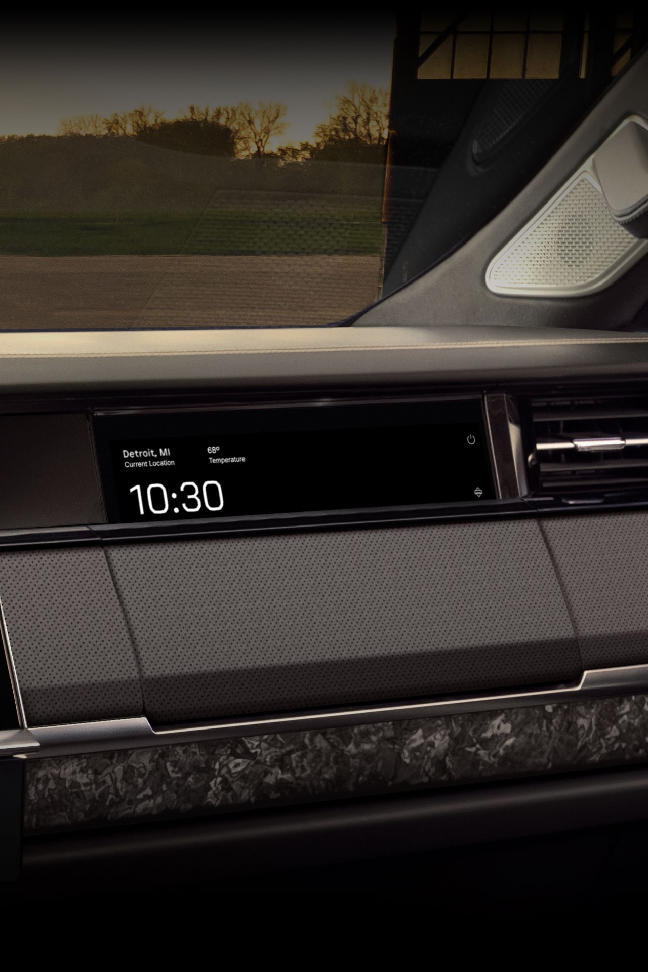 Vue rapprochée de l’écran tactile retrait du passager avant de la prochaine génération de la GMC Sierra 1500 2027.