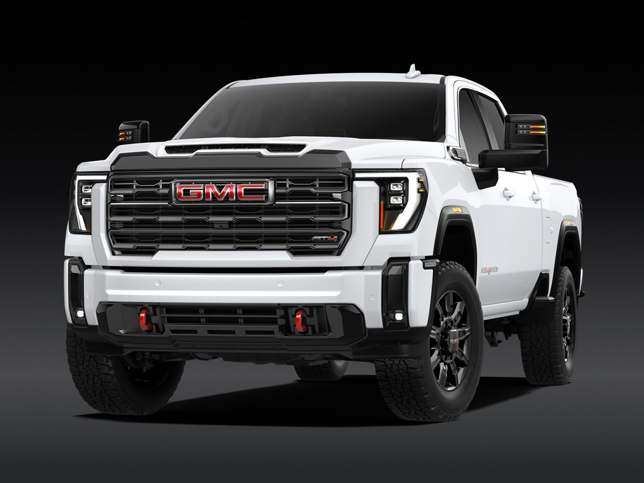 Vue avant d’un GMC Sierra HD AT4 2027 blanc.