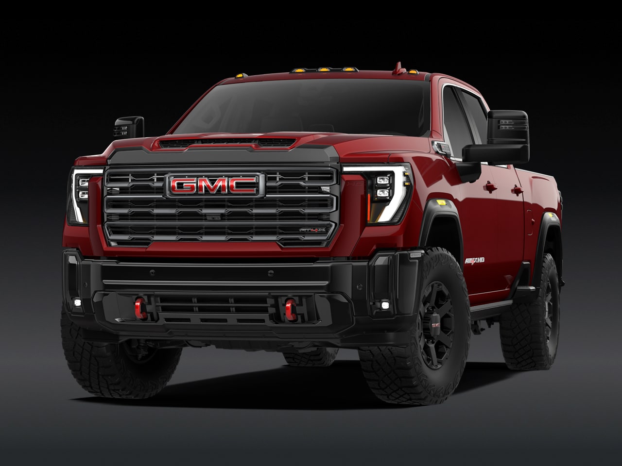 Vue avant d’un GMC Sierra HD AT4X 2027 rouge.