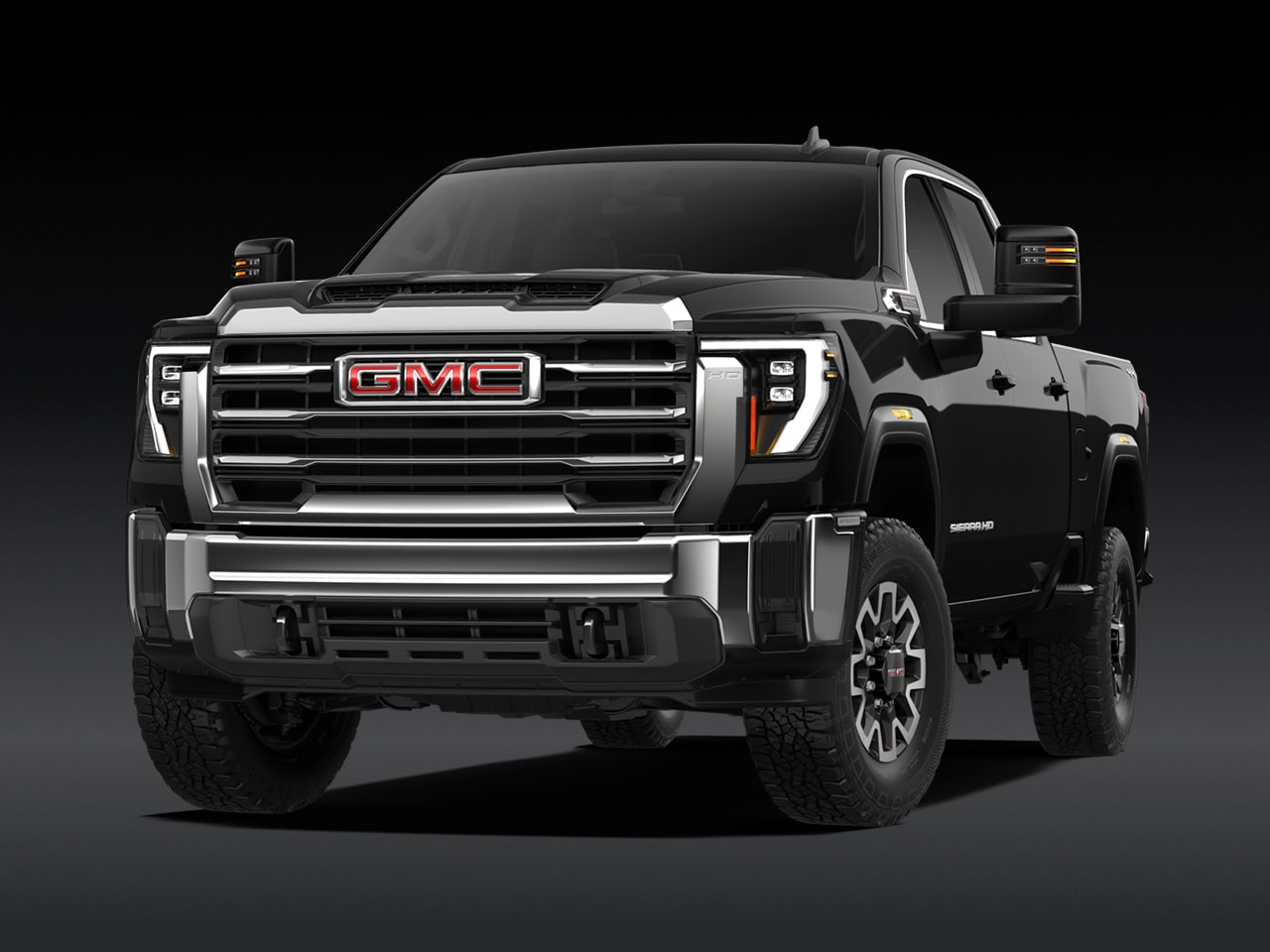 Vue avant d’un GMC Sierra HD SLE 2027 noir.