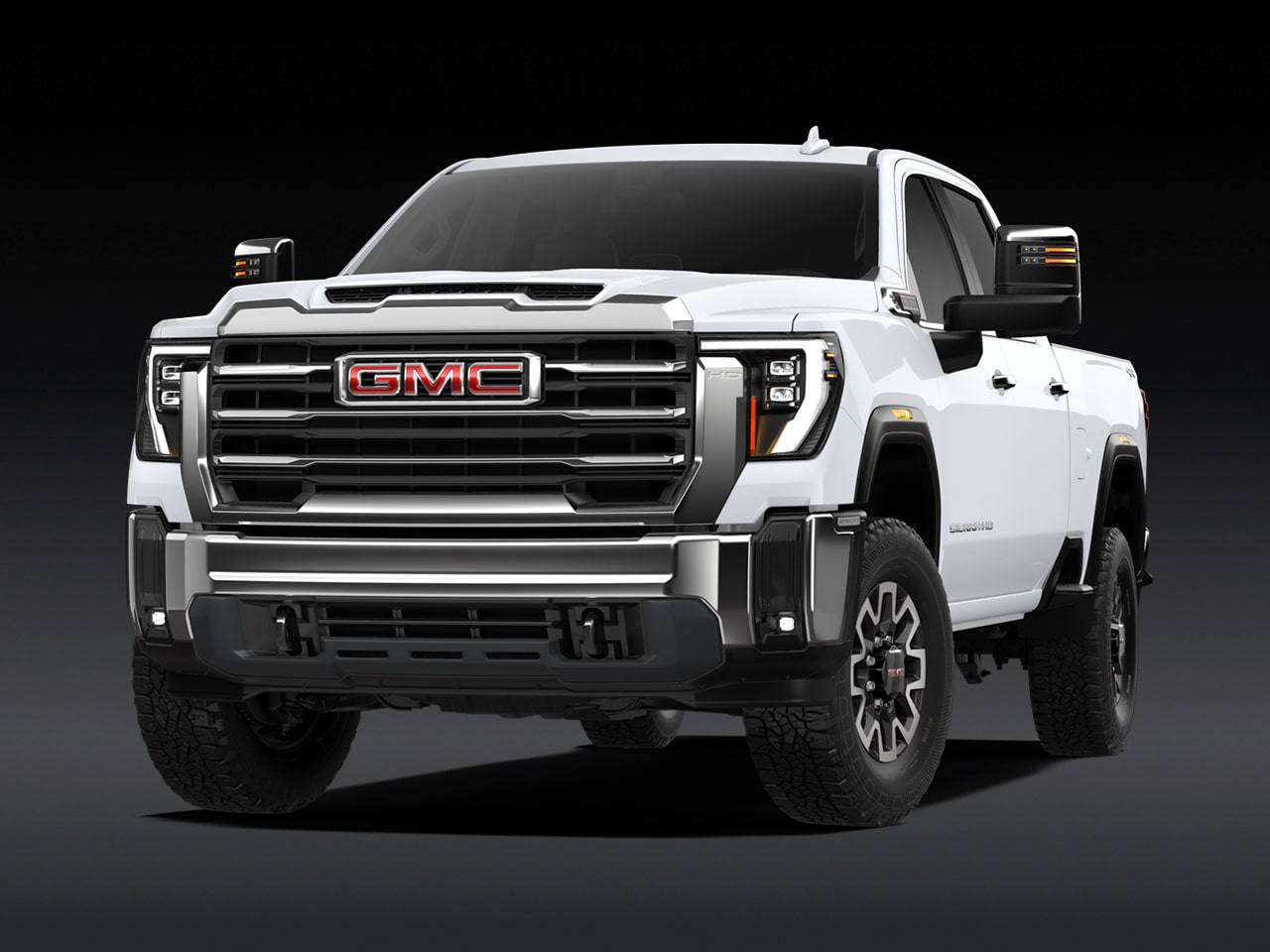 Vue avant d’un GMC Sierra HD SLT 2027 blanc.