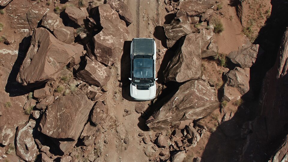 Overhead view of the Hummer EV off-roading.