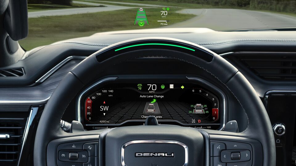 2022 GMC Sierra Denali HUD and steering wheel.