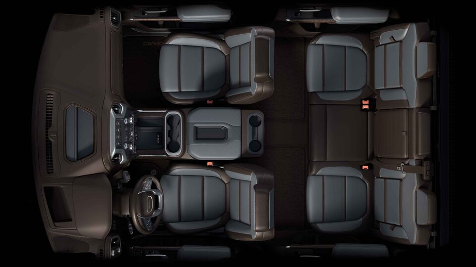 Bird's-eye view of the 2022 Sierra HD interior dark walnut/dark ash grey seats.
