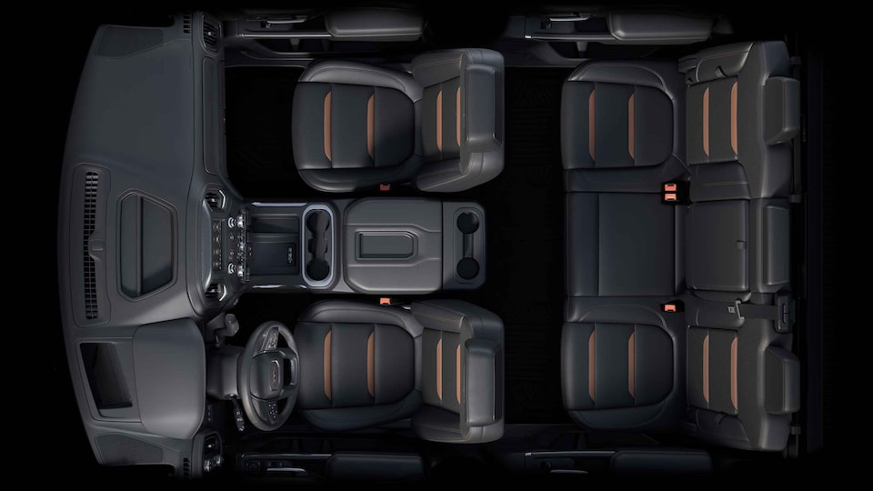 Bird's-eye view of the 2022 Sierra HD interior jet black with kalahari accents seats.