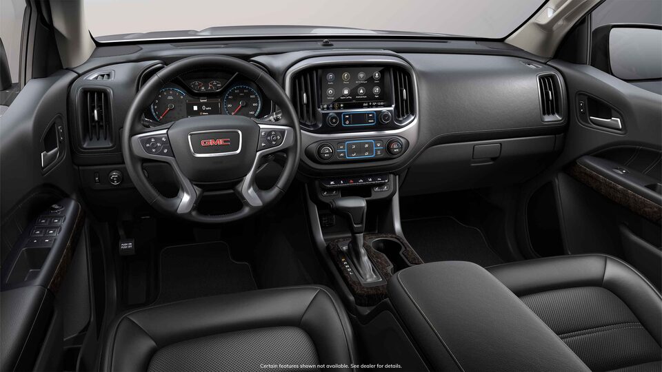 Front interior view of the 2022 GMC Canyon in Jet Black Leather-appointed seats.