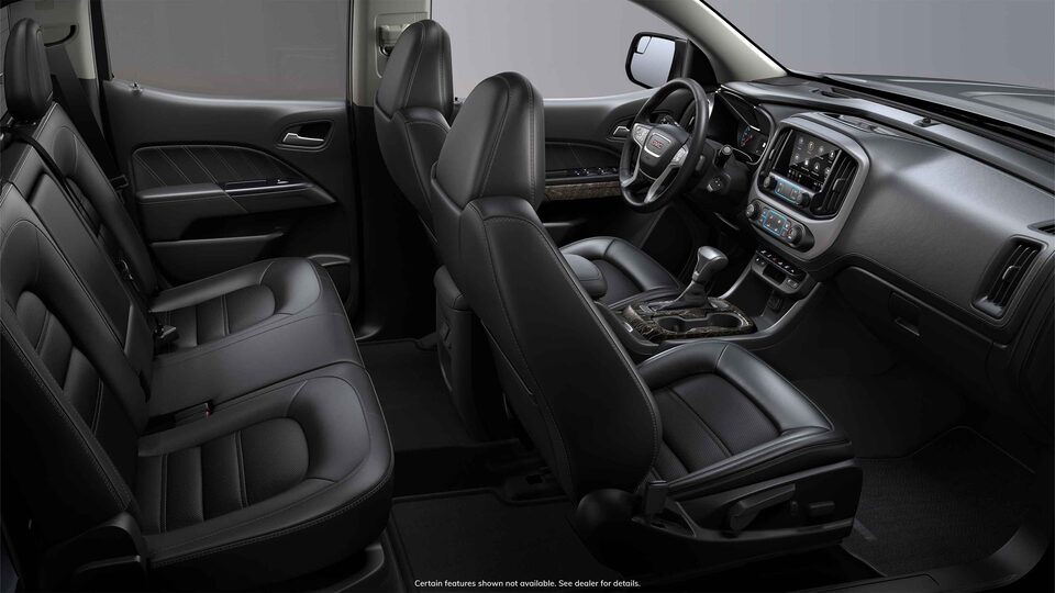 Side interior view of the 2022 GMC Canyon in Jet Black Leather-appointed seats.