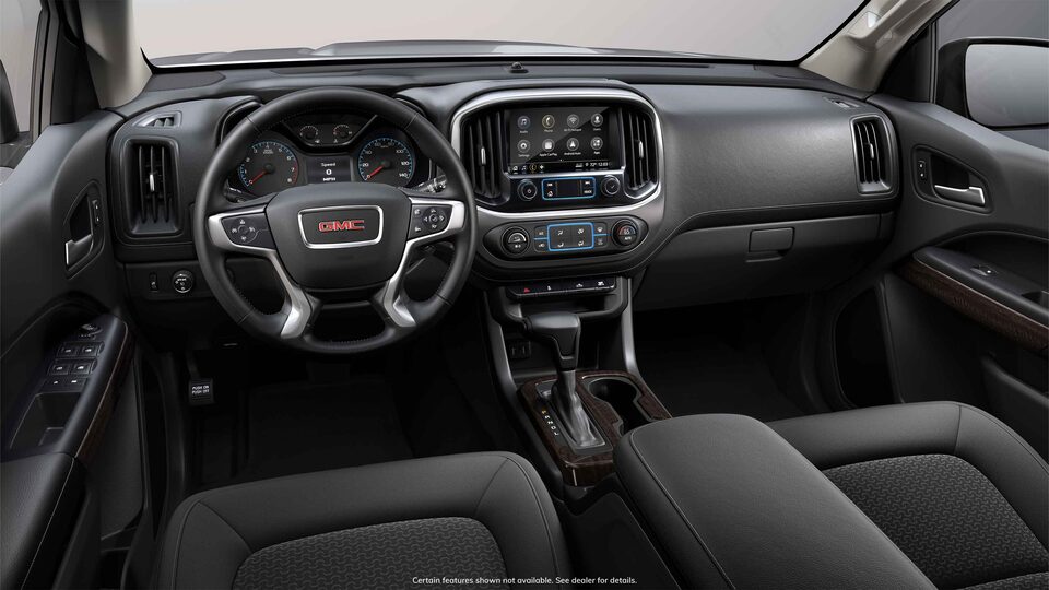 Intérieur avant du GMC Canyon 2022 en tissu noir jais.