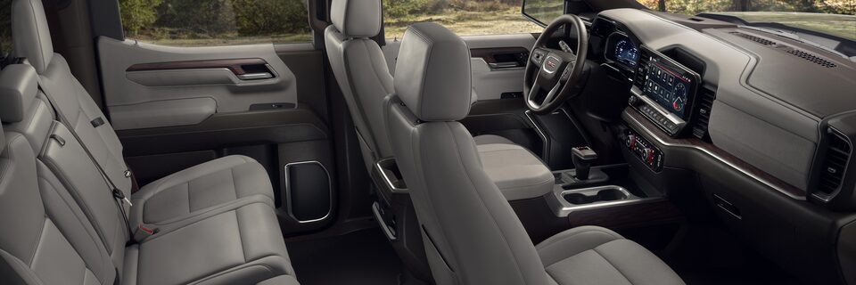 2023 GMC Sierra 1500 SLE and SLT interior seating side profile view.