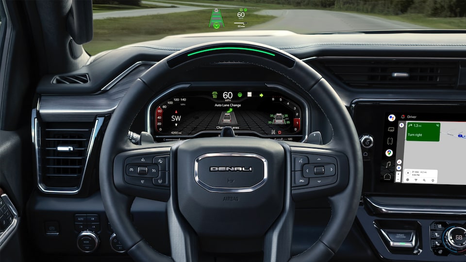 Close-up of 2023 GMC Sierra 1500 steering wheel featuring the Super Cruise.