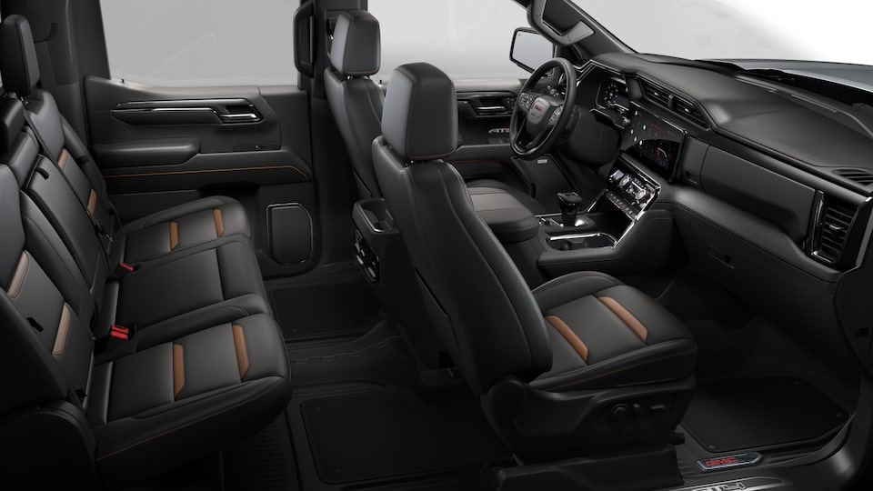 Side interior view of the 2023 GMC Sierra 1500 in Jet Black with Kalahari Accents.