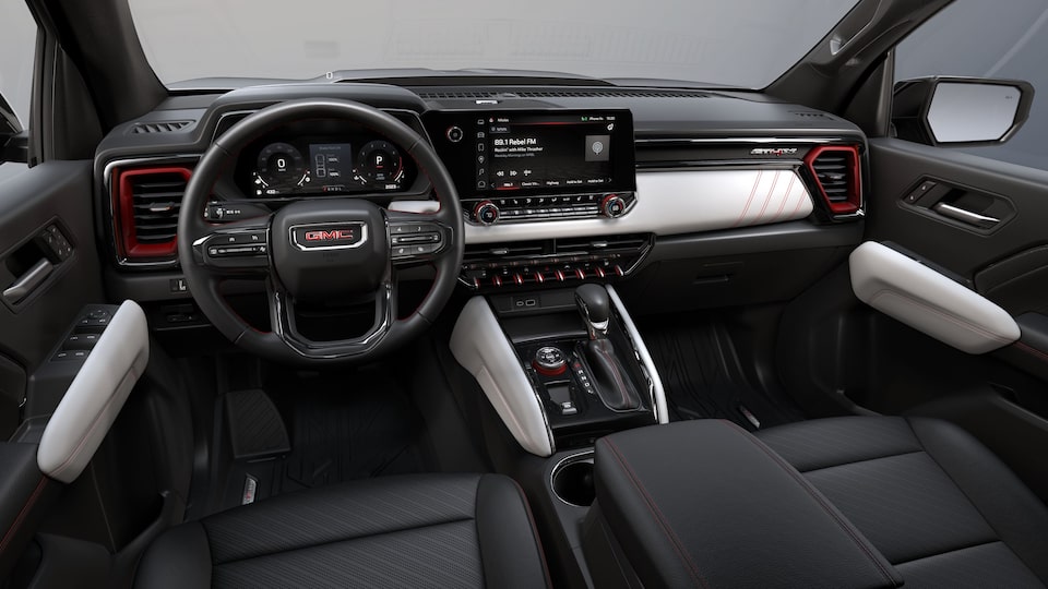 2024 GMC Canyon AT4X interior in Obsidian Rush with Ceramic White Accents.