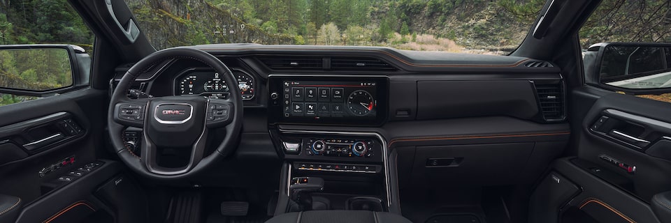 Rear seating perspective of the interiors of the 2024 GMC Sierra 1500 AT4.