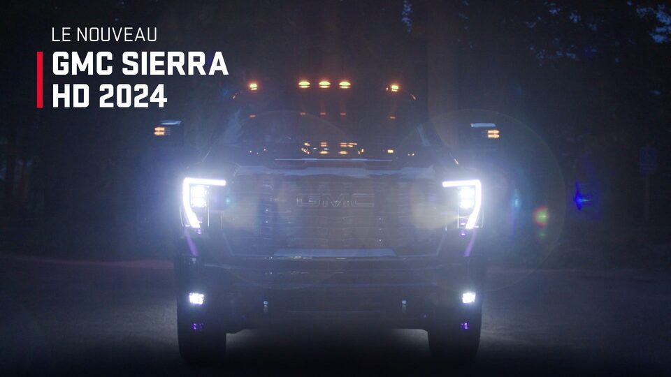 The 2024 Sierra HD AT4, Denali, and Denali Ultimate trims on display.