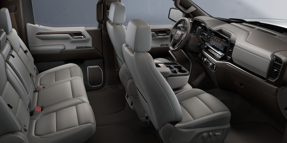 2024 GMC Sierra SLT interior seating in Dark Walnut.