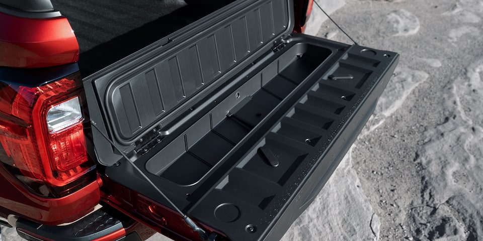 Close-up of the Open Multistow Tailgate on the 2025 GMC Canyon Denali.
