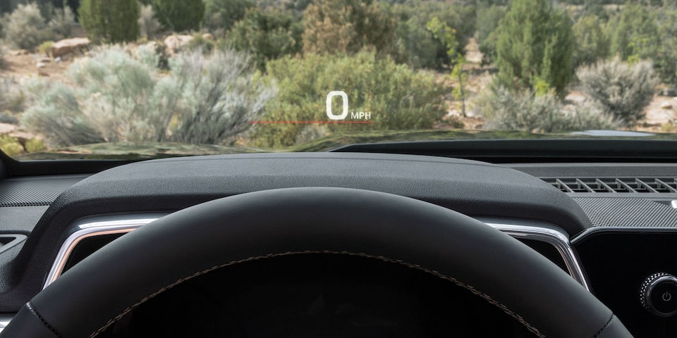 Close-up of the 2025 GMC Canyon Denali Head-up Display on the Windshield.