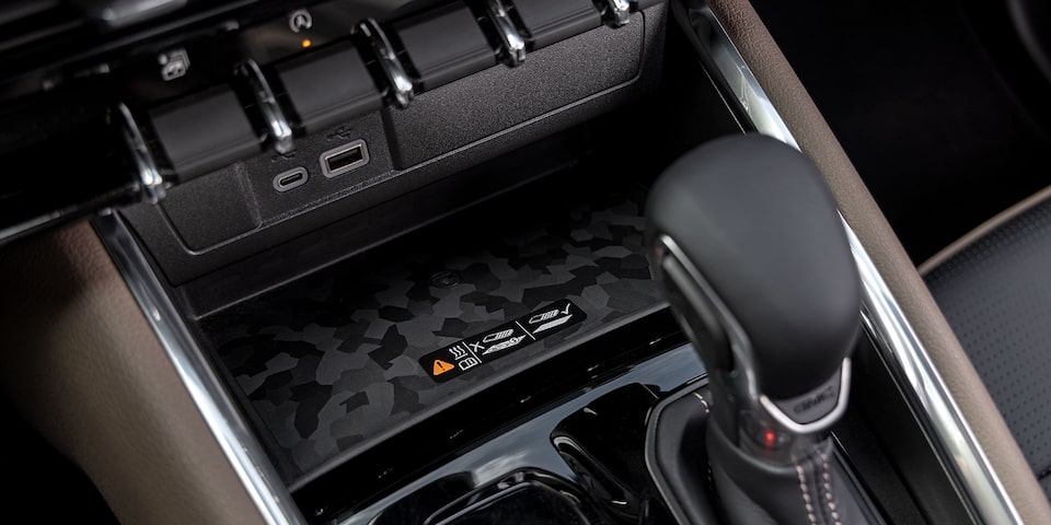 Close-up of the 2025 GMC Canyon Denali Wireless Charging Feature in the Middle Console.