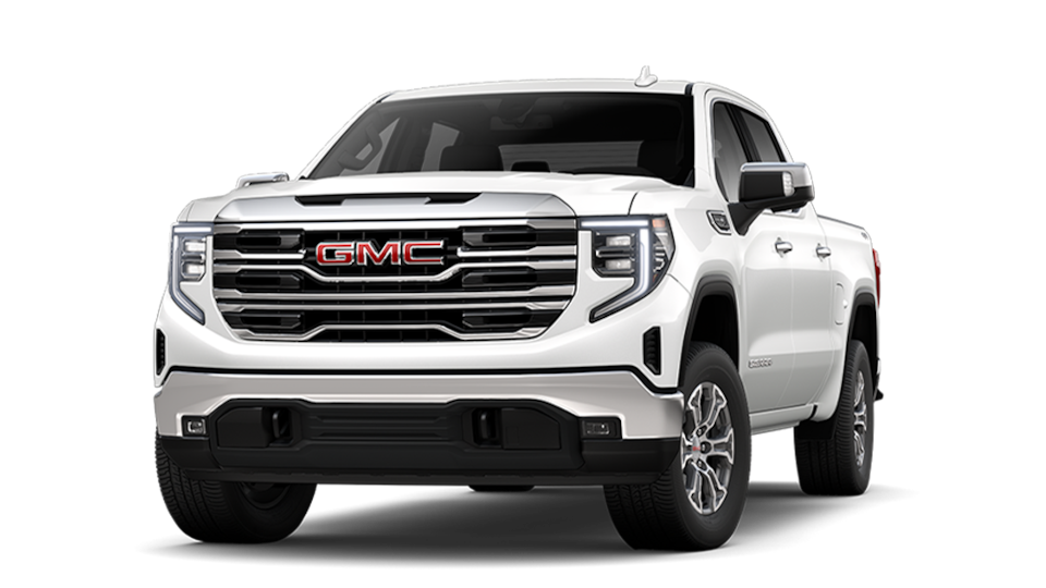  Vue latérale avant d’un camion GMC Sierra 1500 SLT blanc.